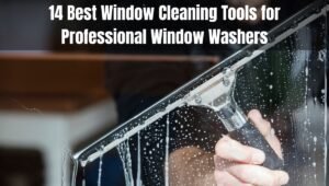 Close-up of a professional using top-rated window cleaning tools, including a squeegee, to achieve streak-free glass during residential window washing.